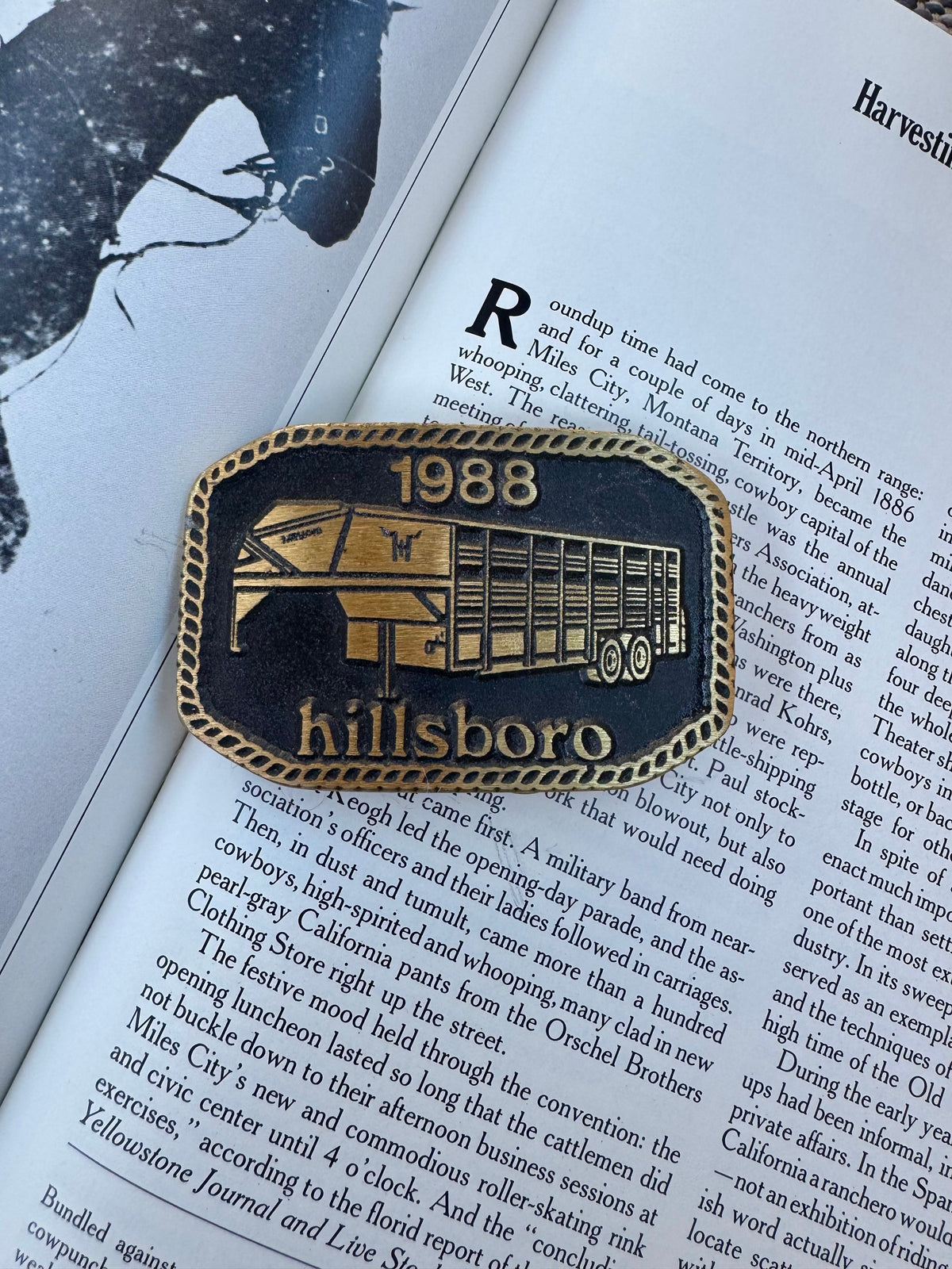 Trailer belt buckle