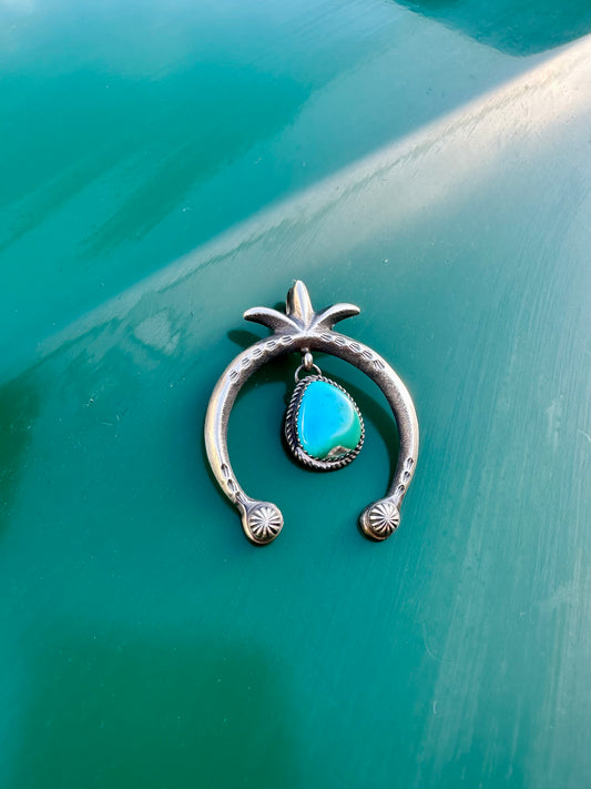 The naja pendant