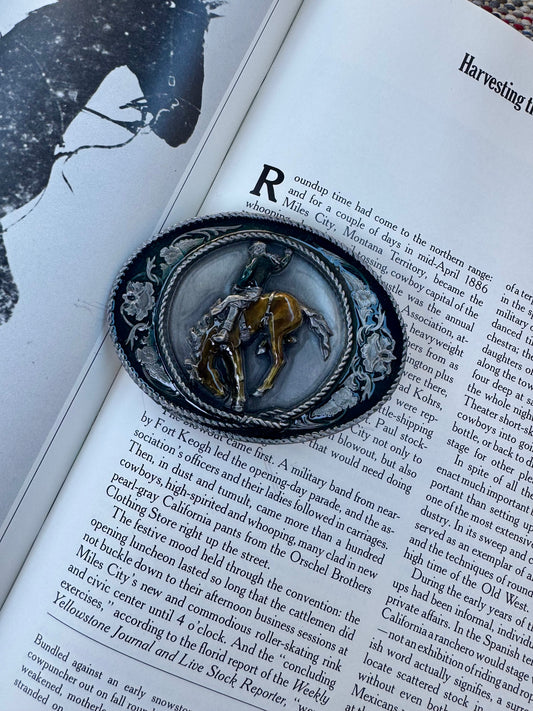 Bronc belt buckle